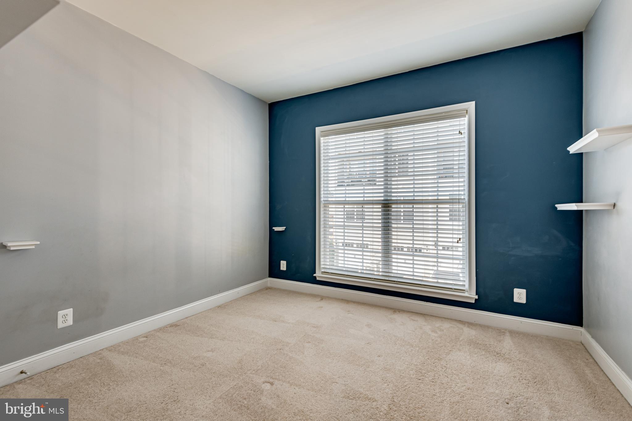 20654 Sibbald Square Ashburn, VA 20147 - Photo 38 of 43 an empty room with windows