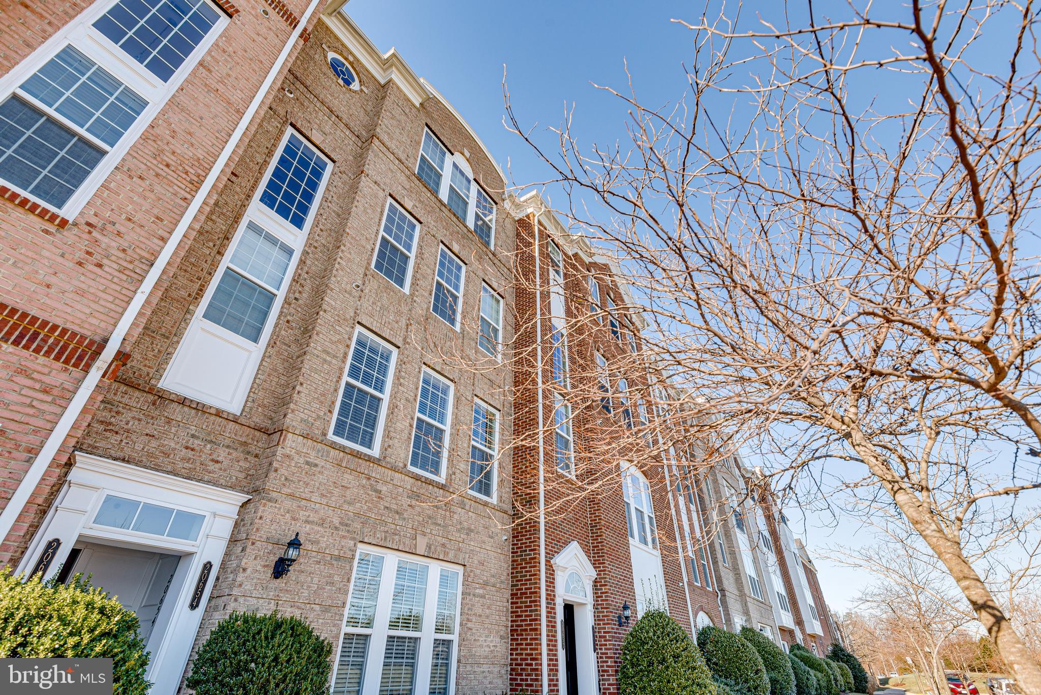 20654 Sibbald Square Ashburn, VA 20147 - Photo 7 of 43 front view of a building
