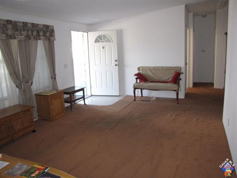 600 Dennison Road, Unit 53 Tehachapi, CA 93561 - Photo 8 of 25 a living room with furniture and a window