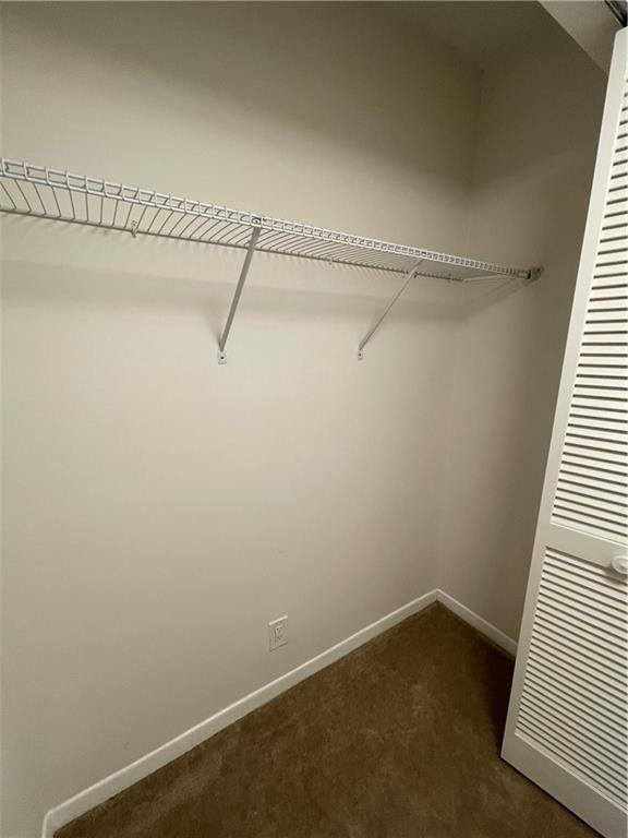 740 South Federal Highway, Unit 312 Pompano Beach, FL 33062 - Photo 18 of 43 a view of a room with racks on the wall
