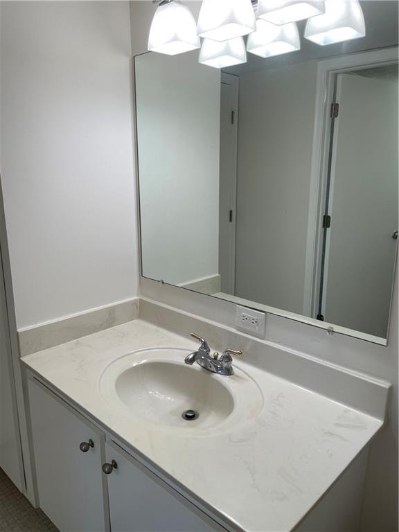 740 South Federal Highway, Unit 312 Pompano Beach, FL 33062 - Photo 19 of 43 a bathroom with a sink and a mirror