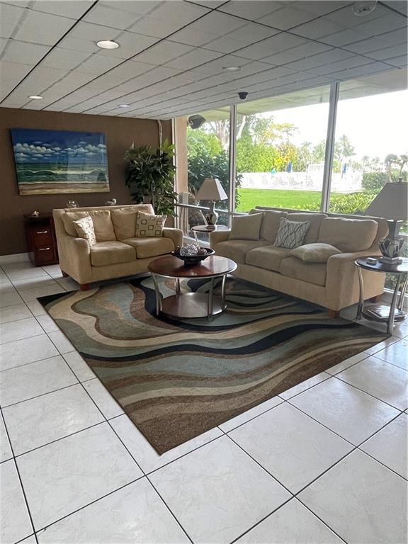 740 South Federal Highway, Unit 312 Pompano Beach, FL 33062 - Photo 36 of 43 a living room with patio furniture and a large window