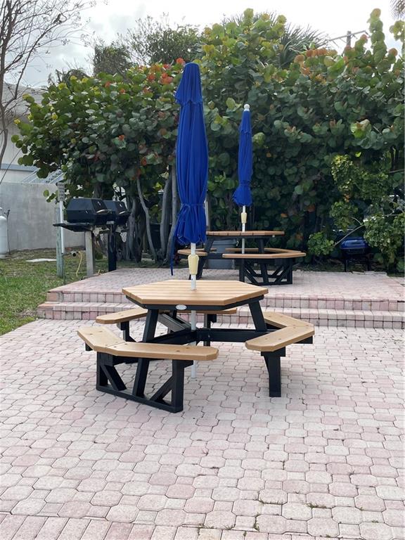 740 South Federal Highway, Unit 312 Pompano Beach, FL 33062 - Photo 39 of 43 a view of a terrace with chairs