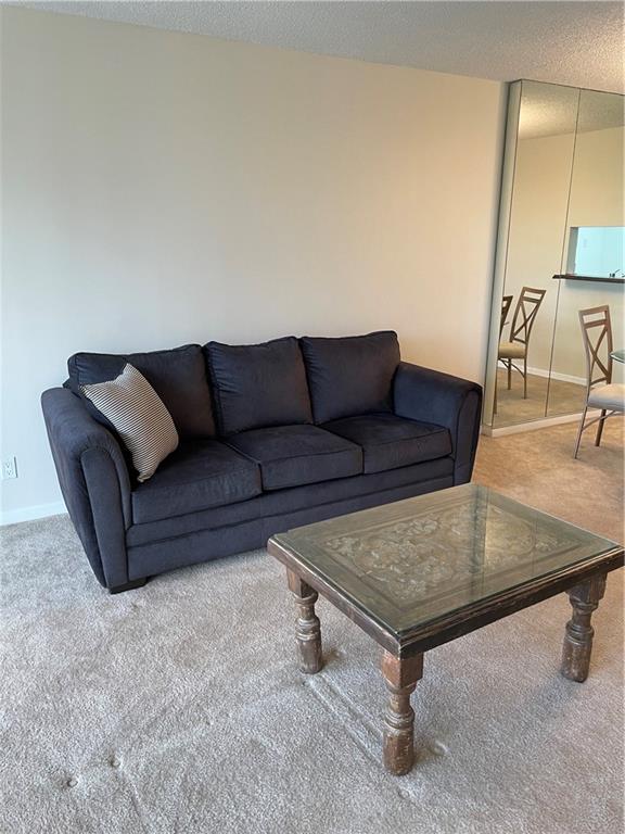 740 South Federal Highway, Unit 312 Pompano Beach, FL 33062 - Photo 6 of 43 a living room with furniture