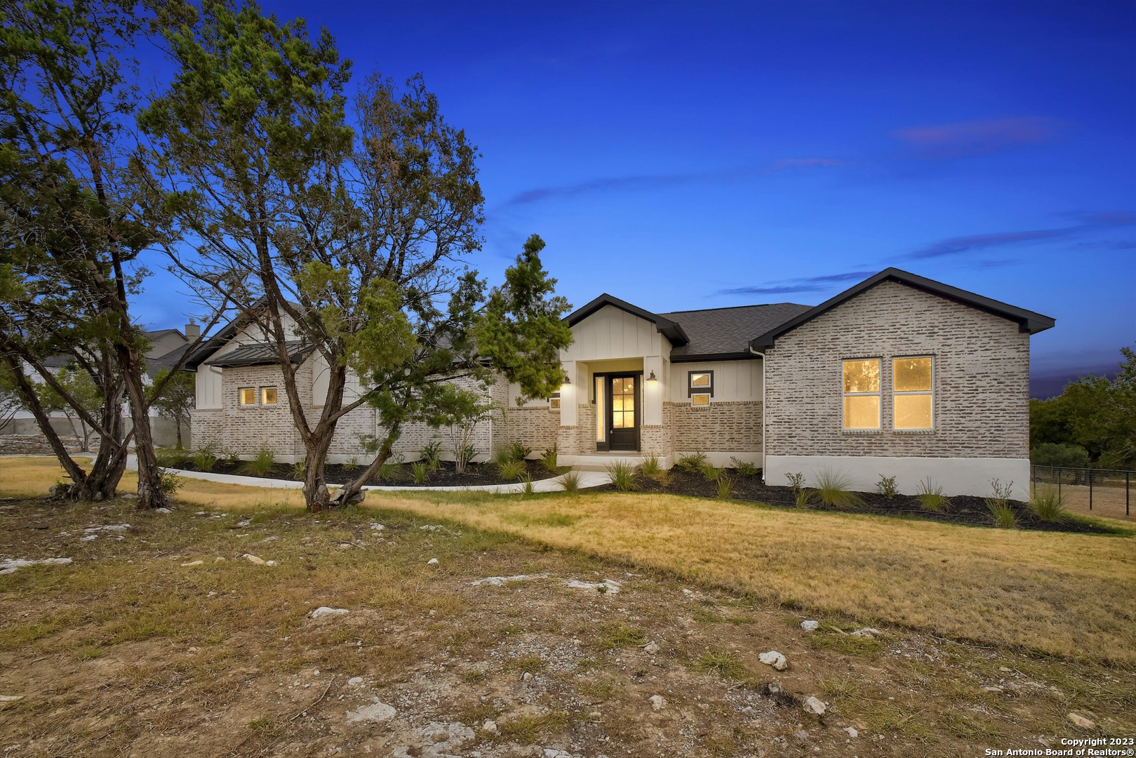 225 High Point Circle Spring Branch, TX 78070 - Photo 1 of 1 a view of a house with a yard