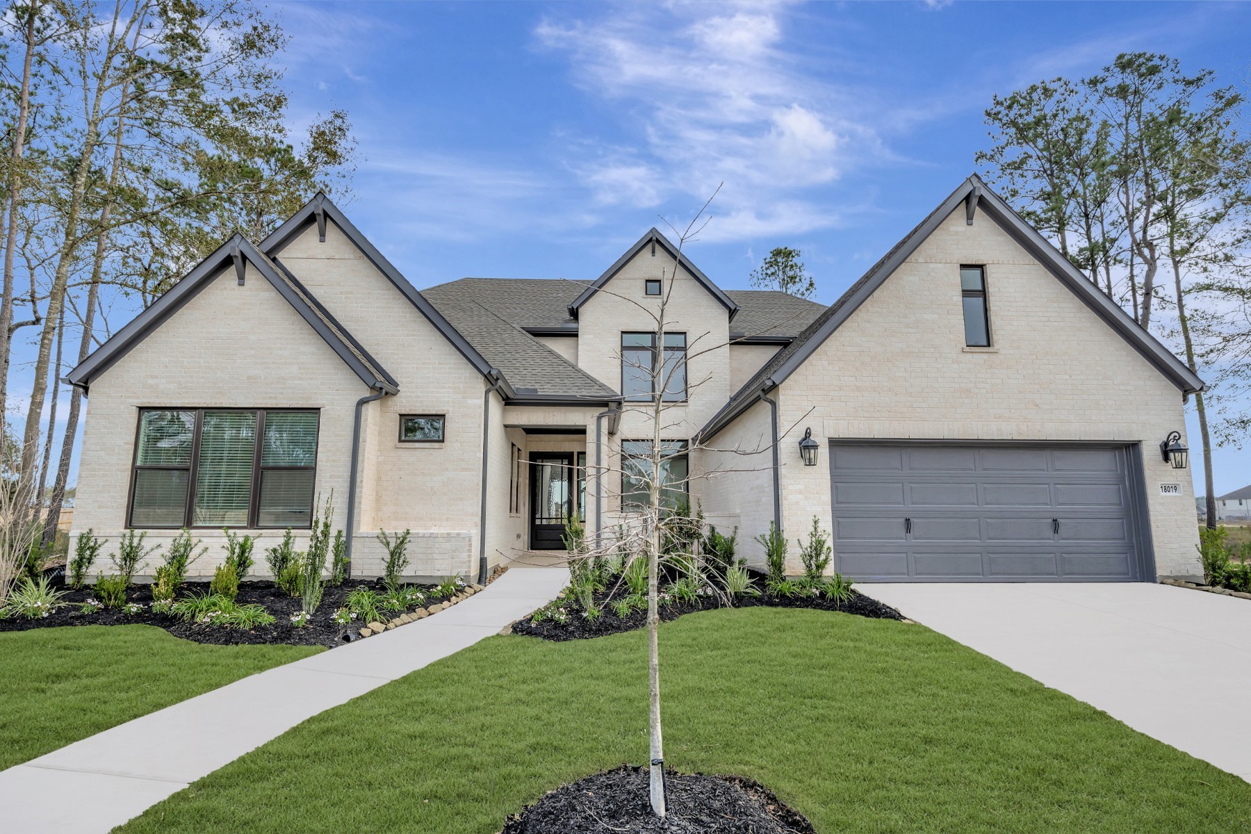 a front view of house with a yard