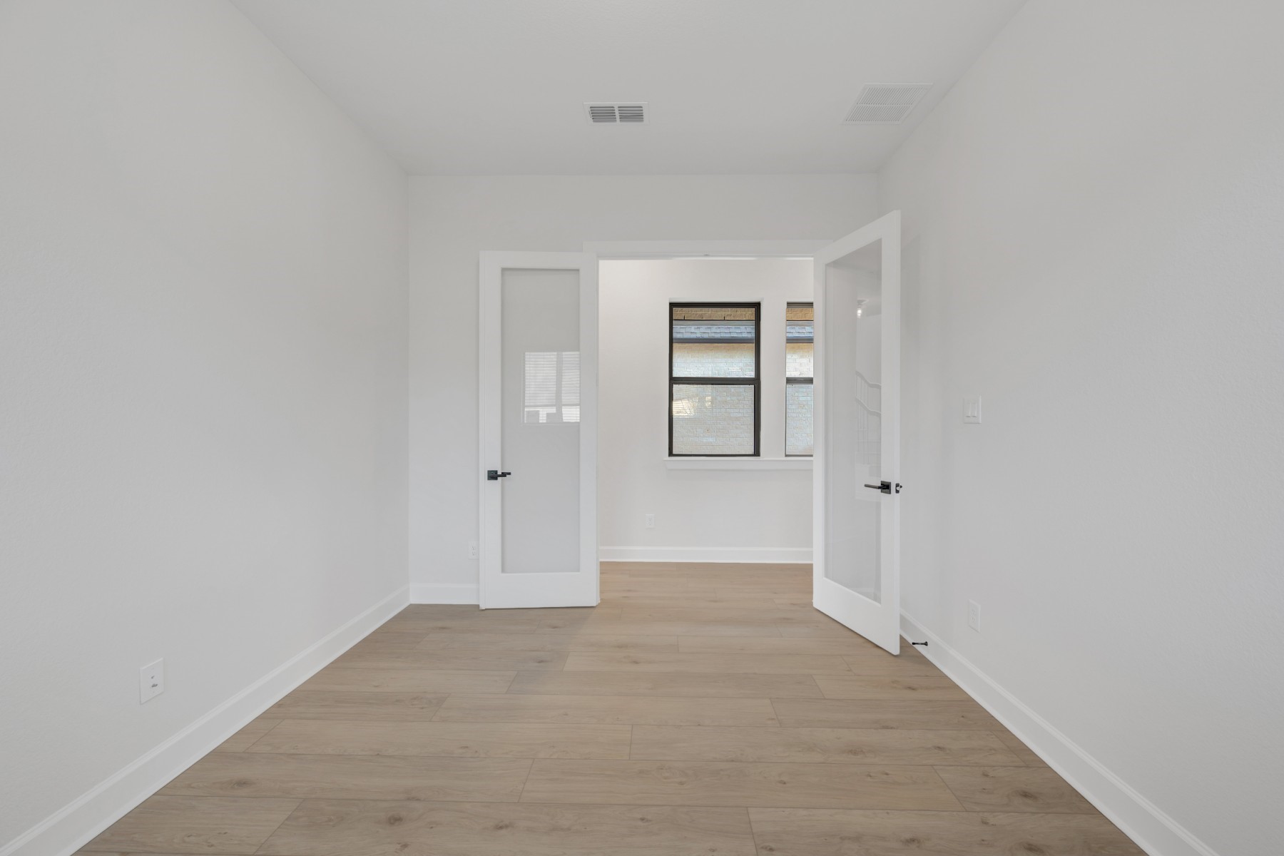 18019 Lobos Point Lane Conroe, TX 77302 - Photo 12 of 49 a view of an empty room