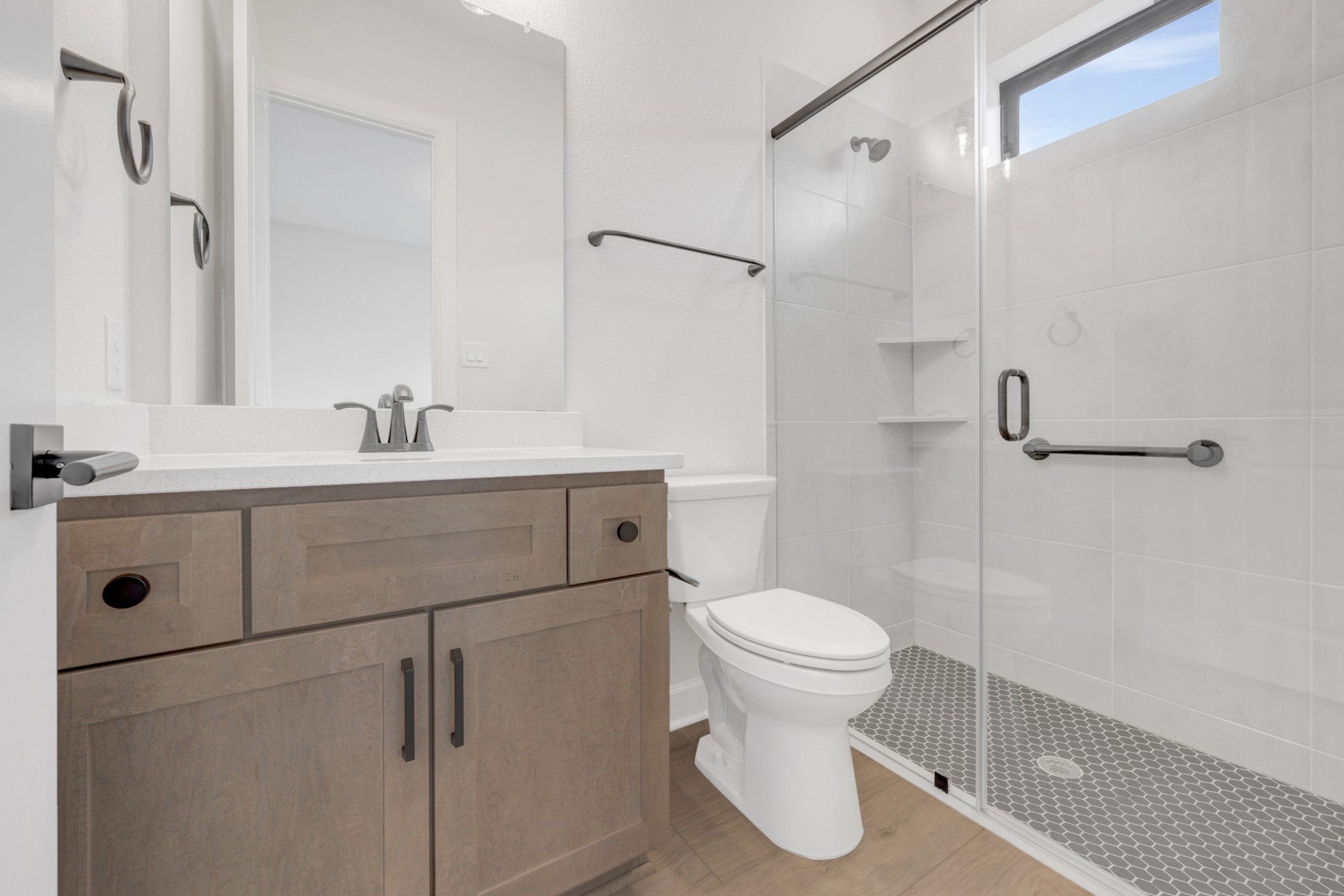 18019 Lobos Point Lane Conroe, TX 77302 - Photo 13 of 49 a bathroom with a sink toilet and shower