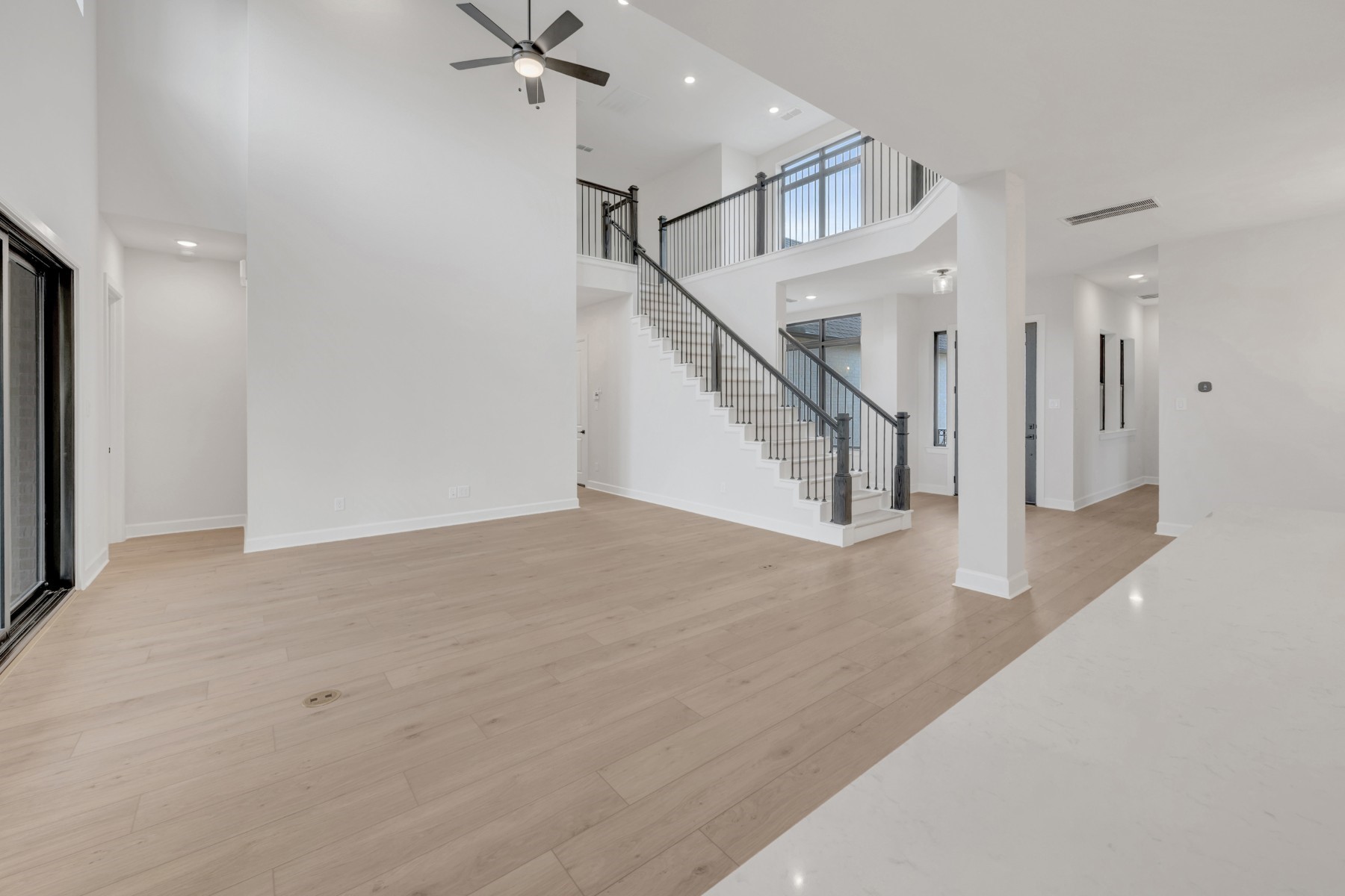 18019 Lobos Point Lane Conroe, TX 77302 - Photo 20 of 49 a view of a hallway with staircase