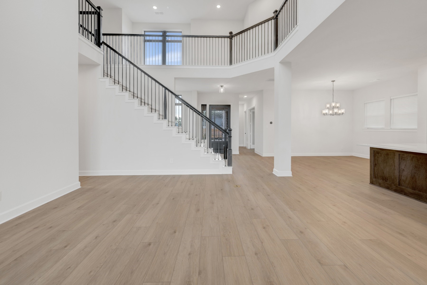 18019 Lobos Point Lane Conroe, TX 77302 - Photo 24 of 49 a view of entryway and hall with wooden floor