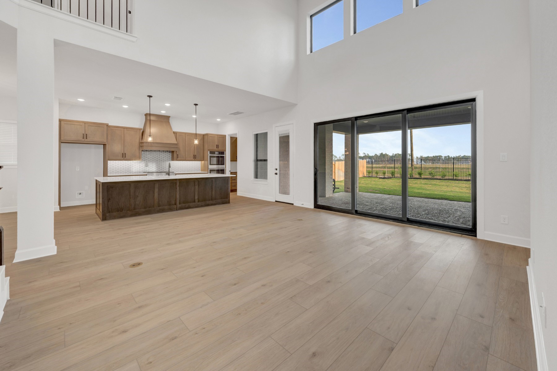 18019 Lobos Point Lane Conroe, TX 77302 - Photo 26 of 49 a view of a kitchen with large windows