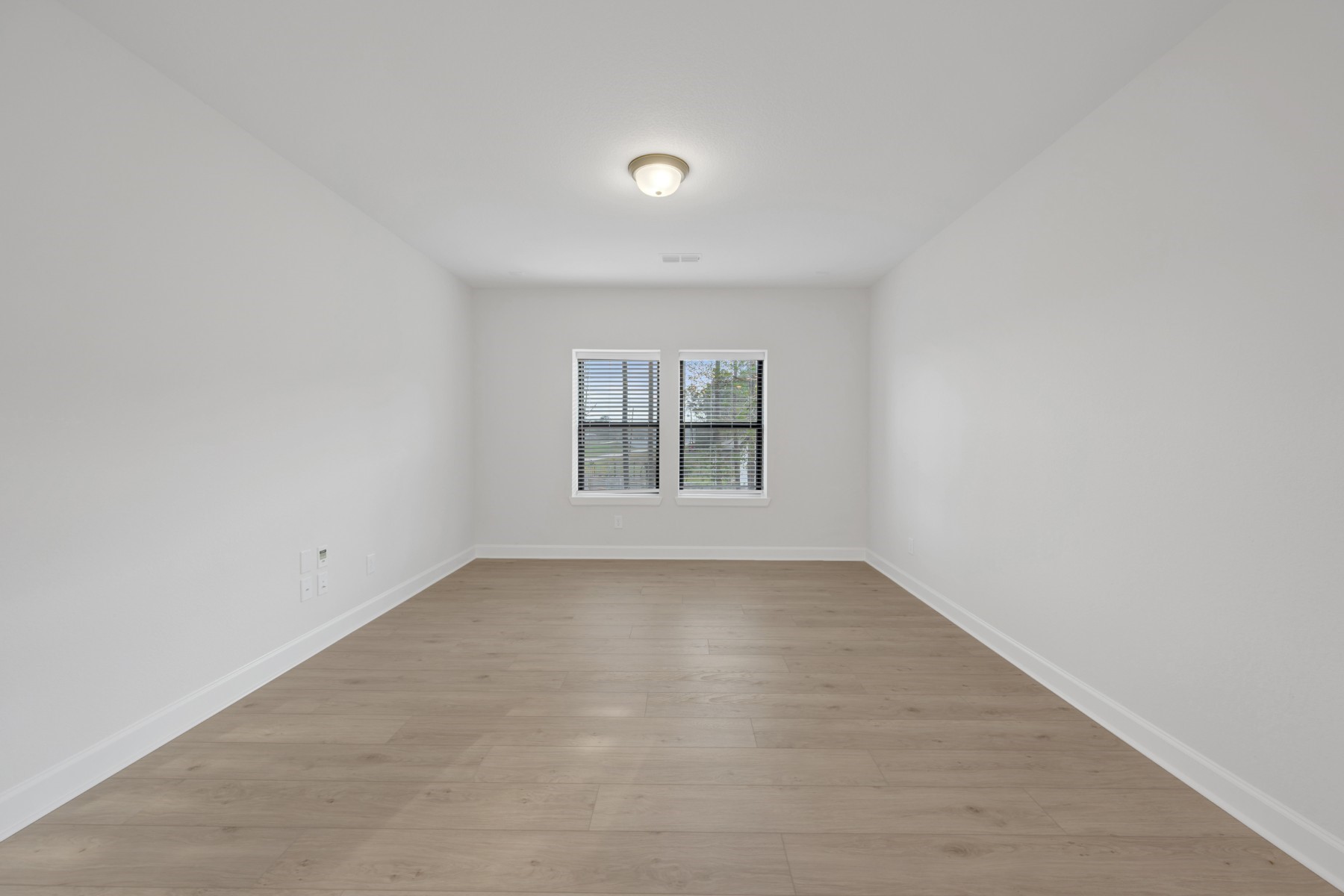 18019 Lobos Point Lane Conroe, TX 77302 - Photo 34 of 49 an empty room with a window