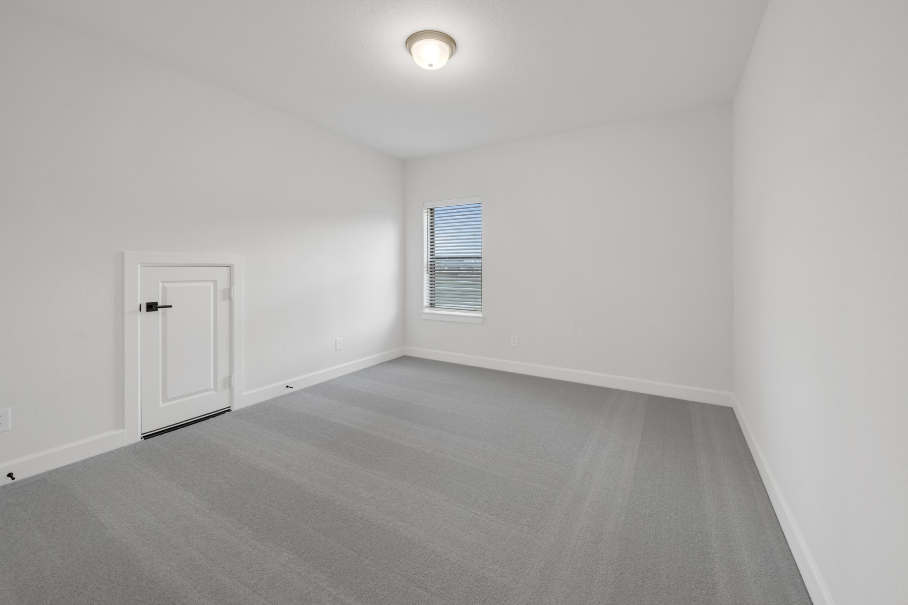 18019 Lobos Point Lane Conroe, TX 77302 - Photo 37 of 49 an empty room with a empty space and window