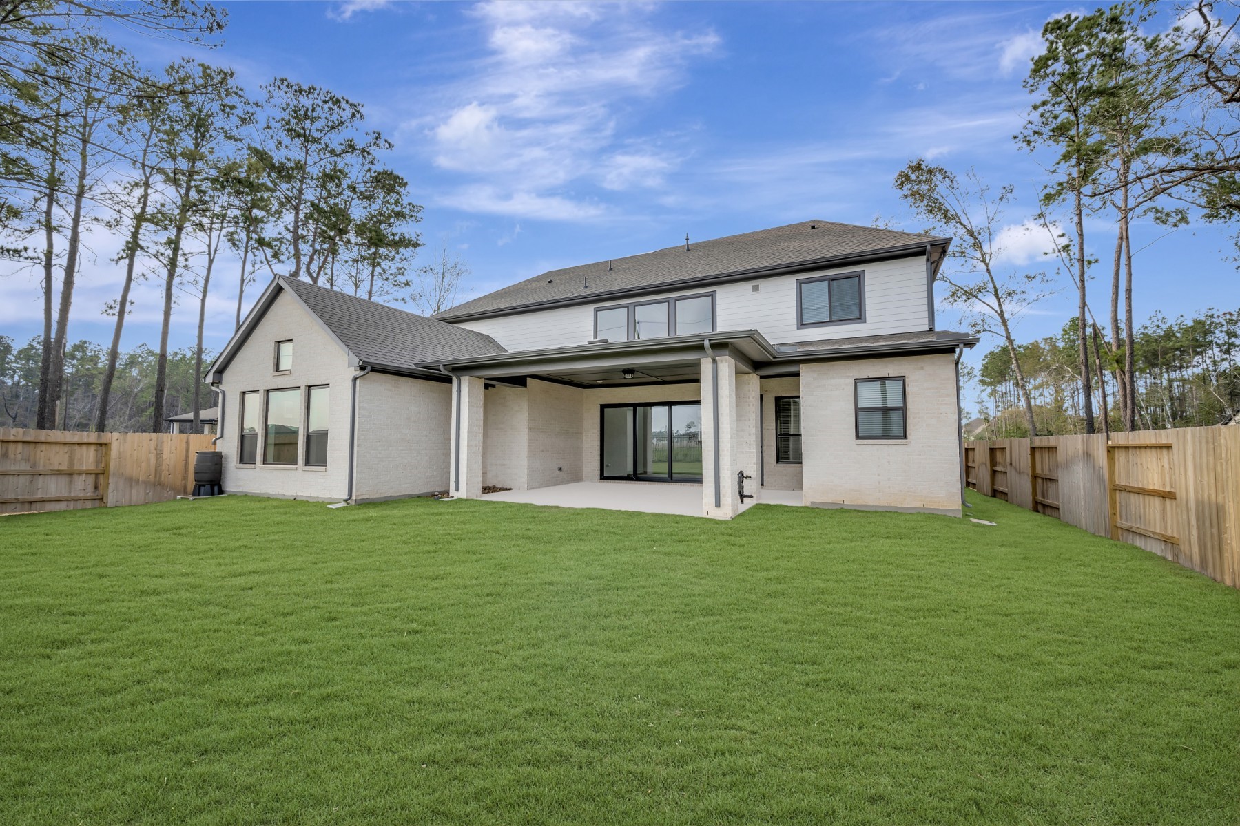 18019 Lobos Point Lane Conroe, TX 77302 - Photo 7 of 49 a view of a yard in front of a house