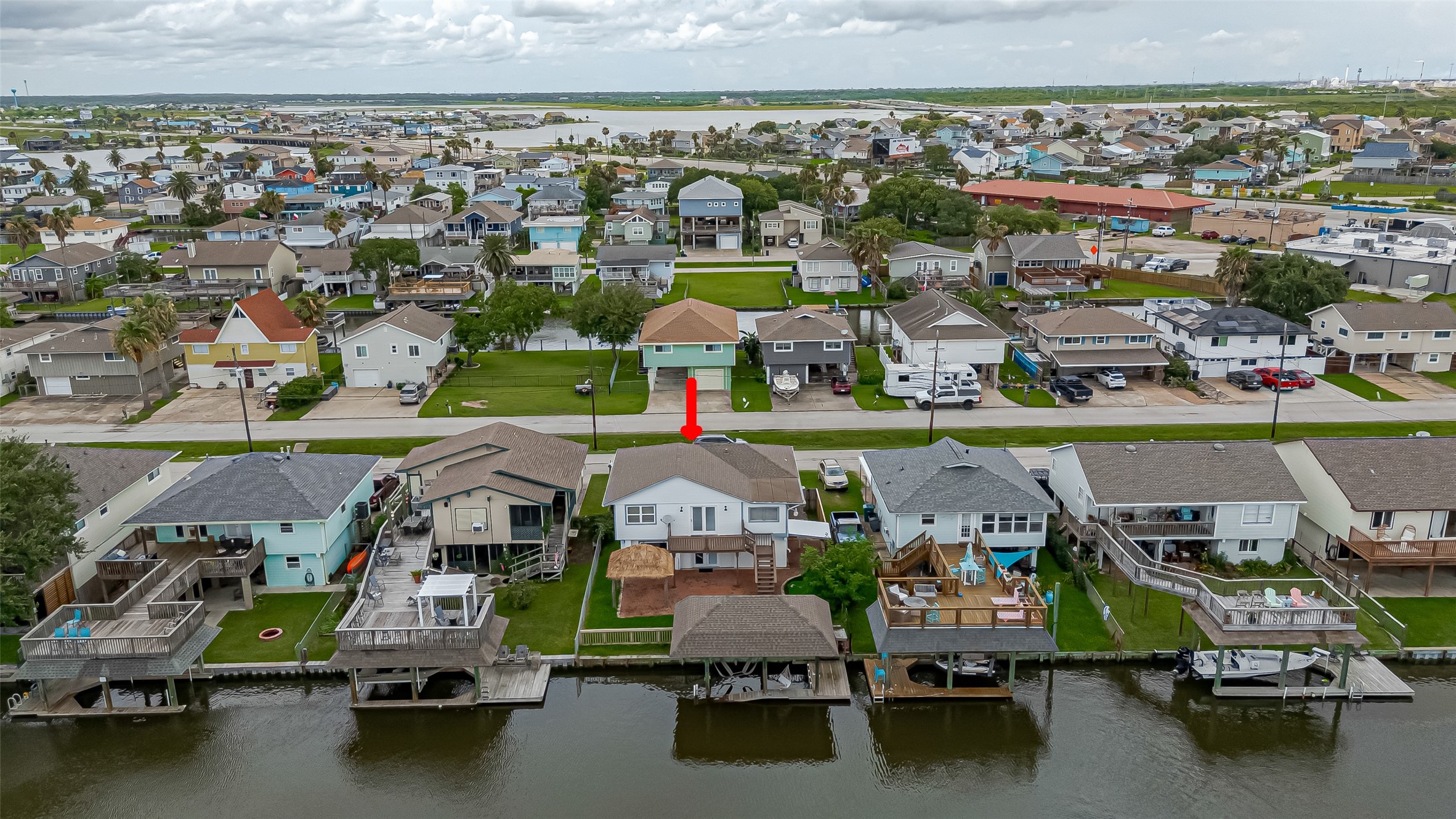 228 Barracuda Street Bayou Vista, TX 77563 - Photo 1 of 44 an aerial view of a yard with swimming pool and outdoor seating