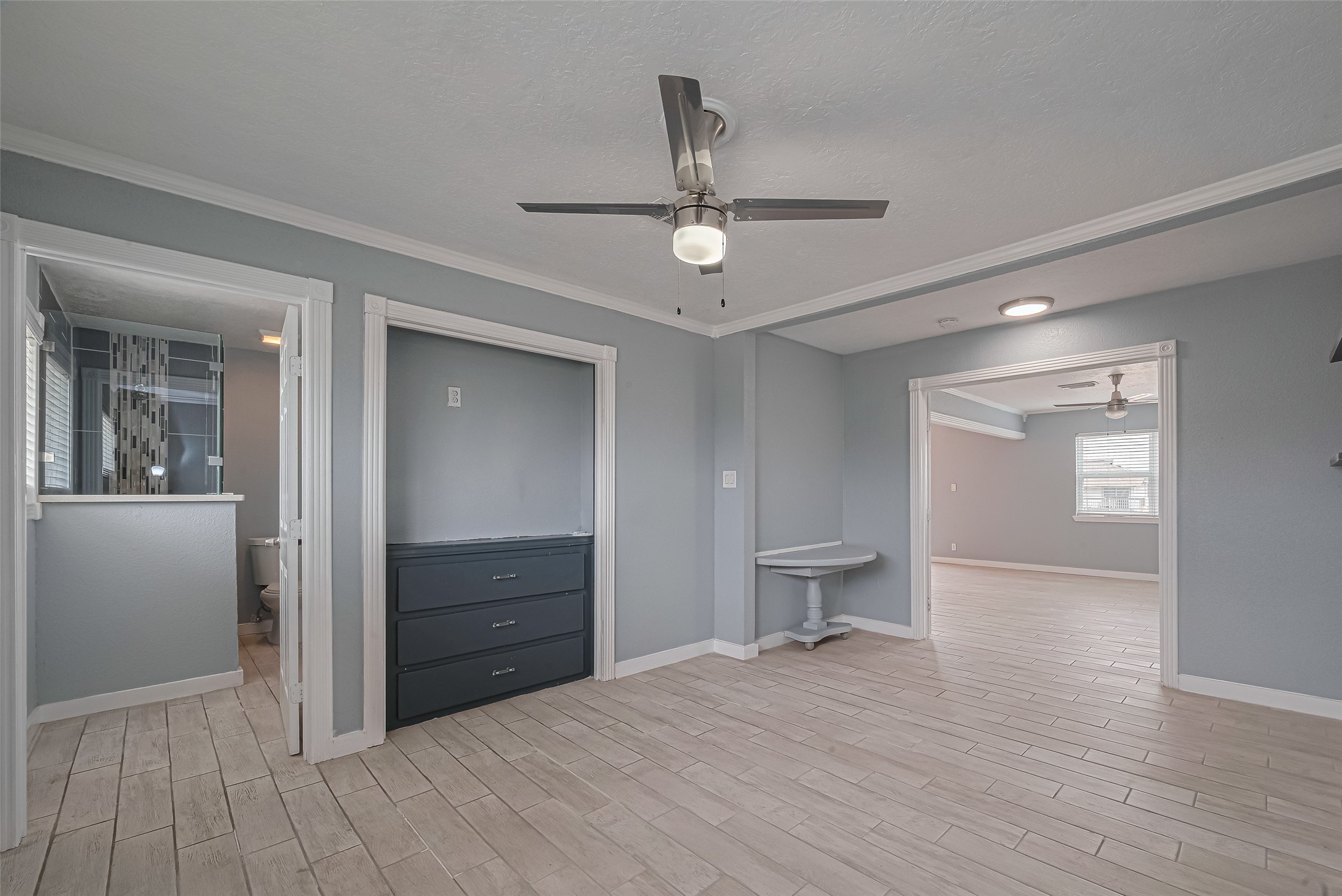 228 Barracuda Street Bayou Vista, TX 77563 - Photo 13 of 44 wooden floor and closet in a room