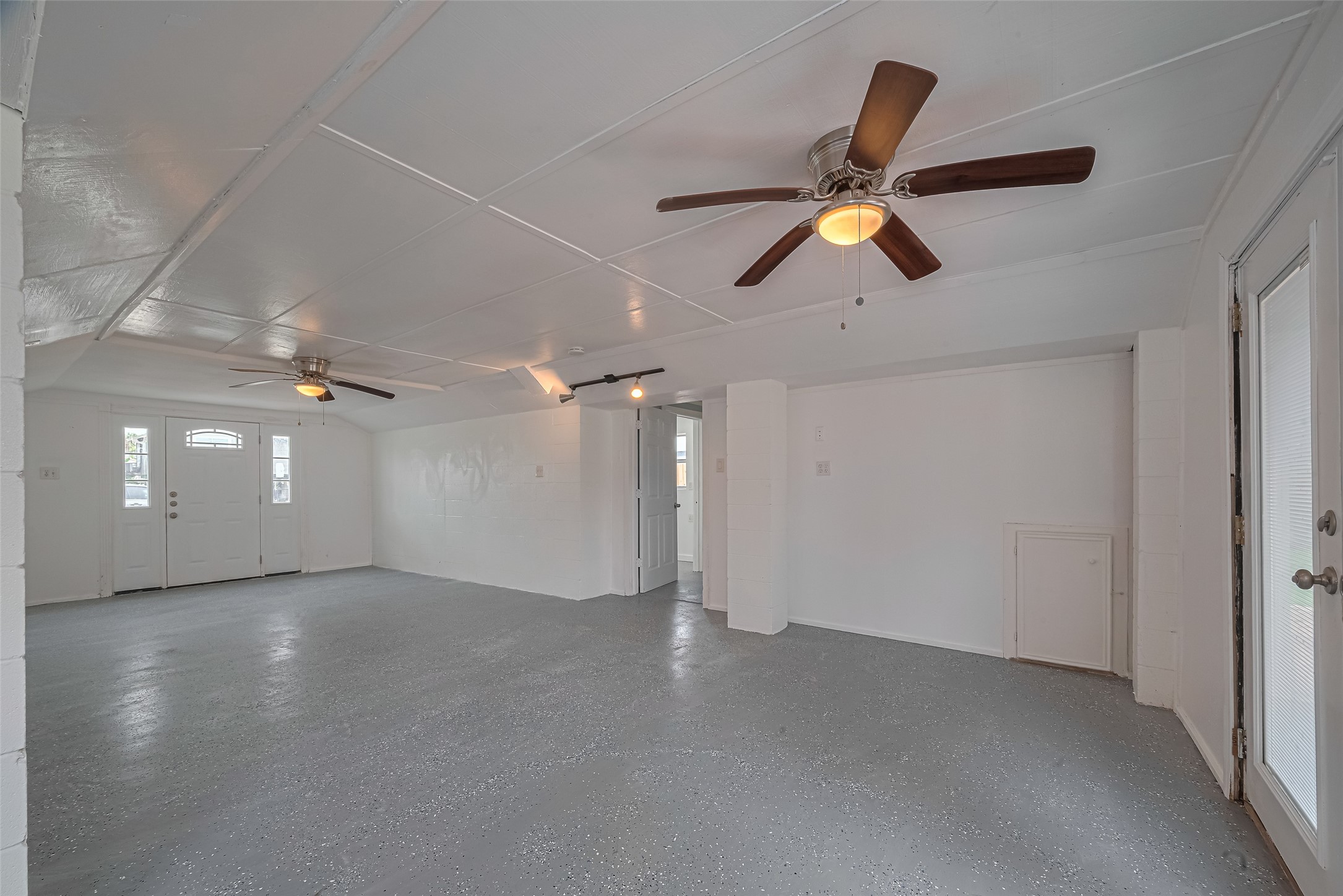 228 Barracuda Street Bayou Vista, TX 77563 - Photo 22 of 44 wooden floor in an empty room with a window