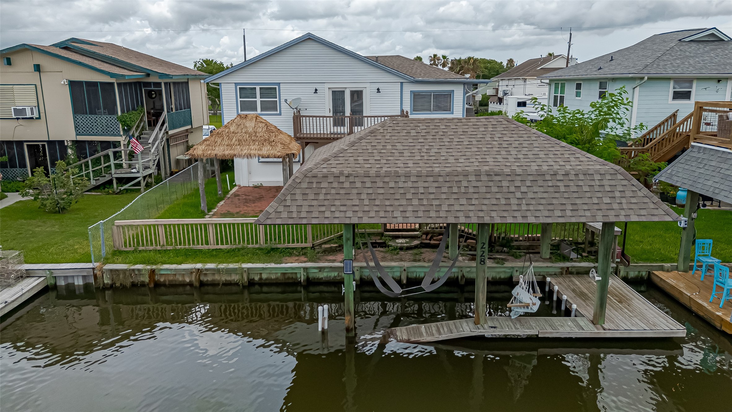 228 Barracuda Street Bayou Vista, TX 77563 - Photo 41 of 44 a aerial view of a house with a yard