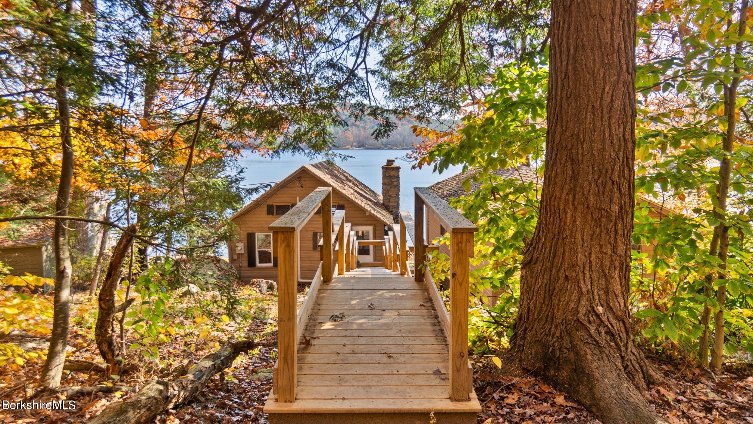 16 Chanterwood Road Lee, MA 01238 - Photo 15 of 27 front view of a house with a tree