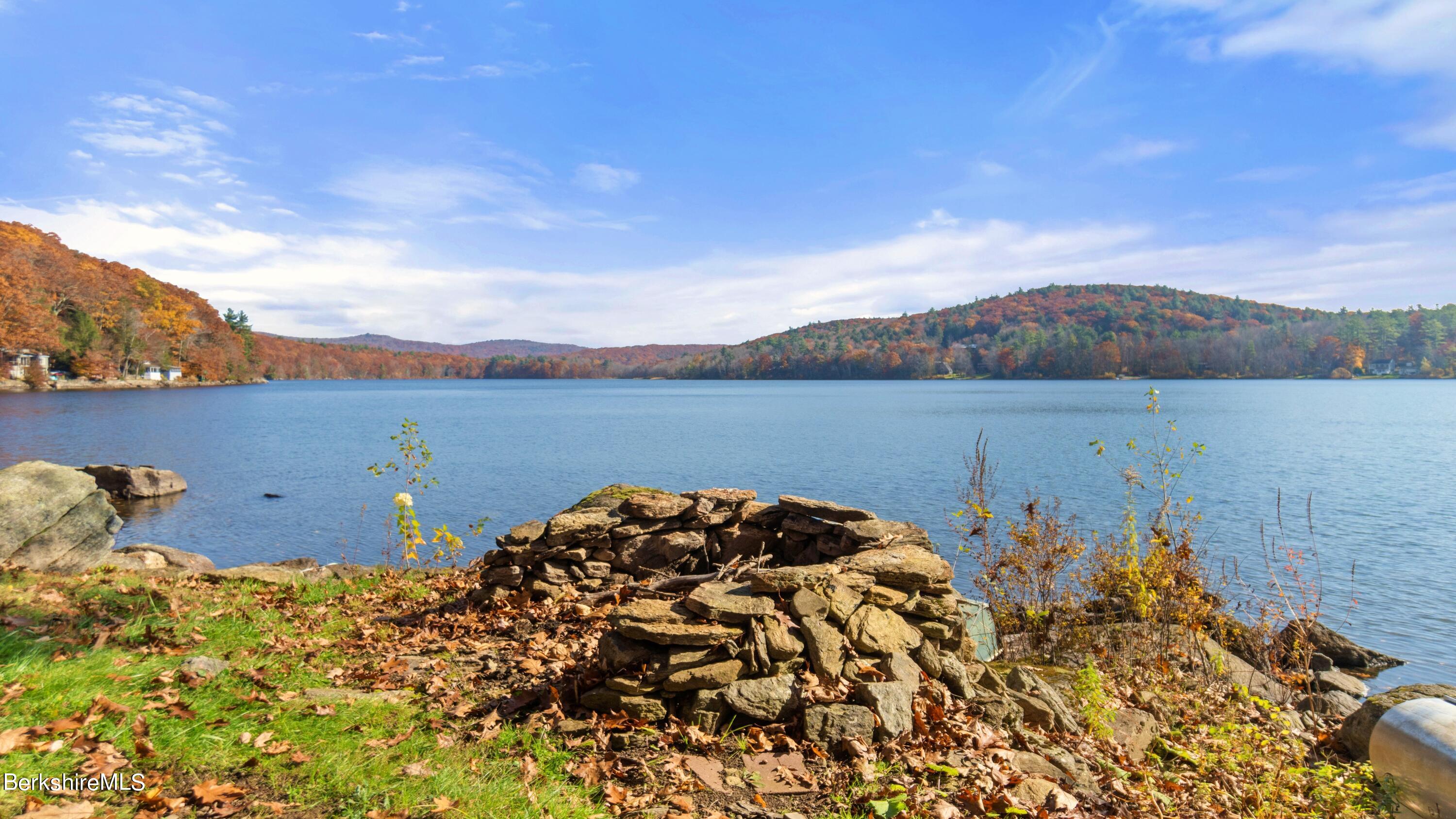 16 Chanterwood Road Lee, MA 01238 - Photo 21 of 27 a view of a lake with a mountain