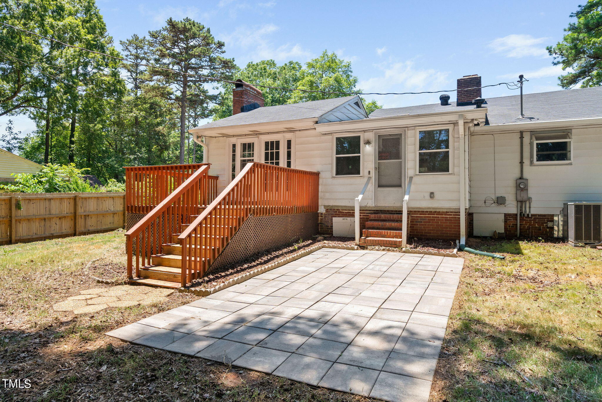 126 Clarendon Crescent Raleigh, NC 27610 - Photo 12 of 40 a view of a house with wooden deck