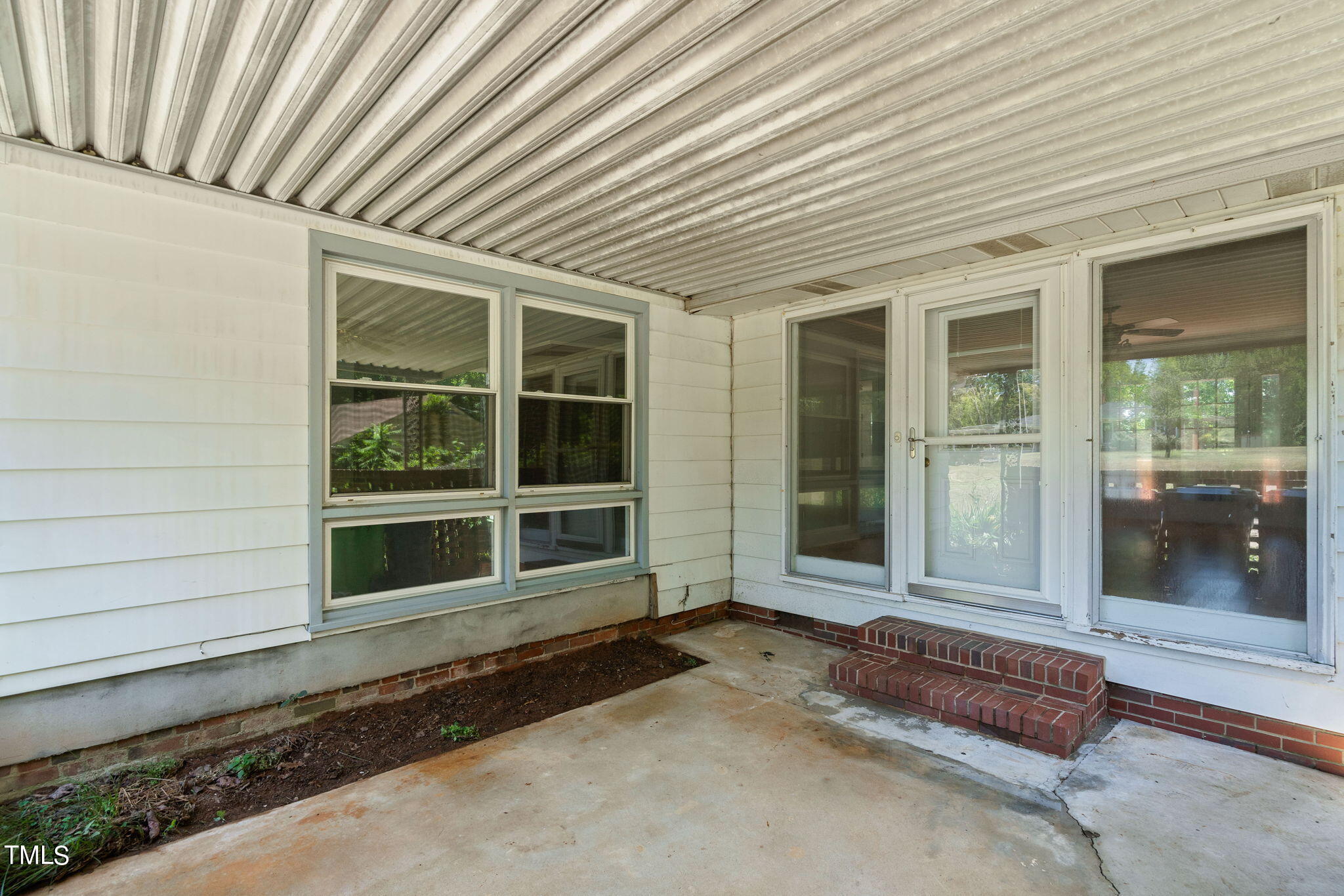 126 Clarendon Crescent Raleigh, NC 27610 - Photo 4 of 40 a front view of a house with a window