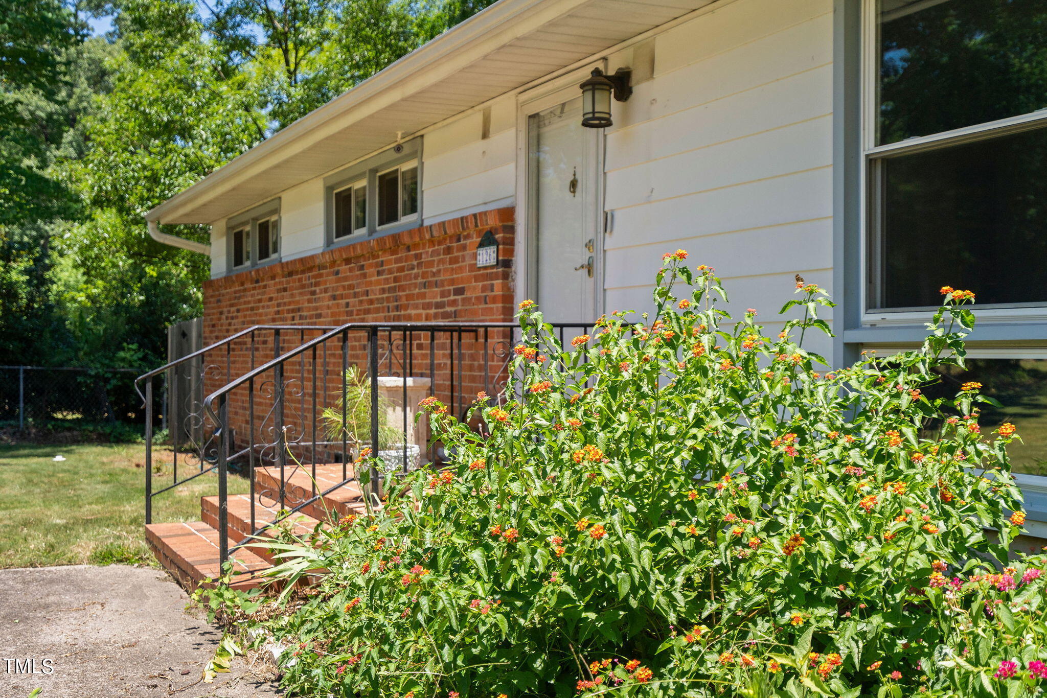 126 Clarendon Crescent Raleigh, NC 27610 - Photo 5 of 40 a house view with a outdoor space