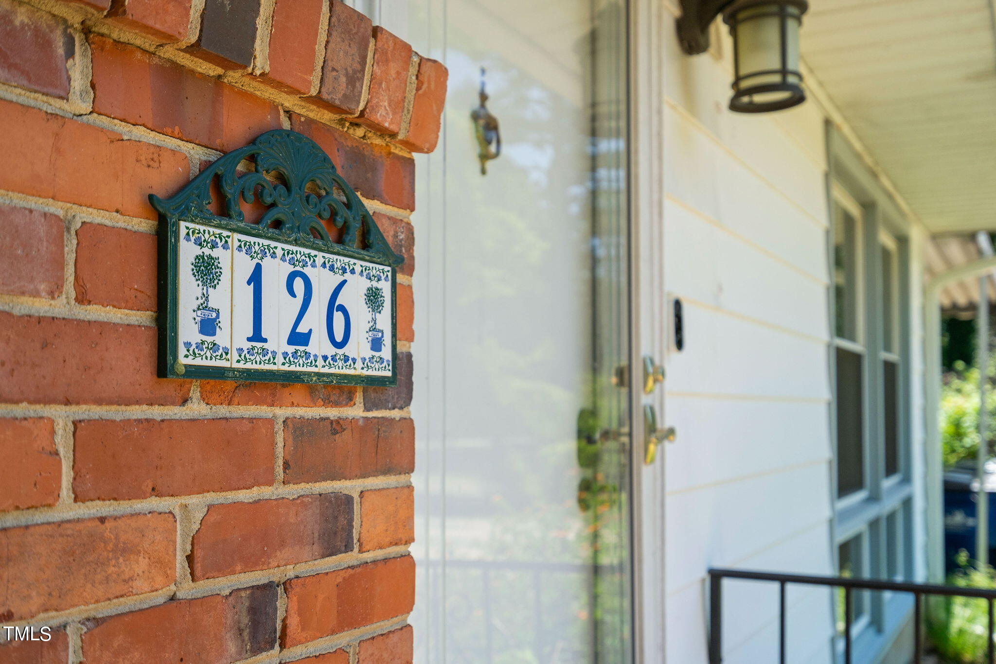 126 Clarendon Crescent Raleigh, NC 27610 - Photo 6 of 40 a sign that is on the side of a building