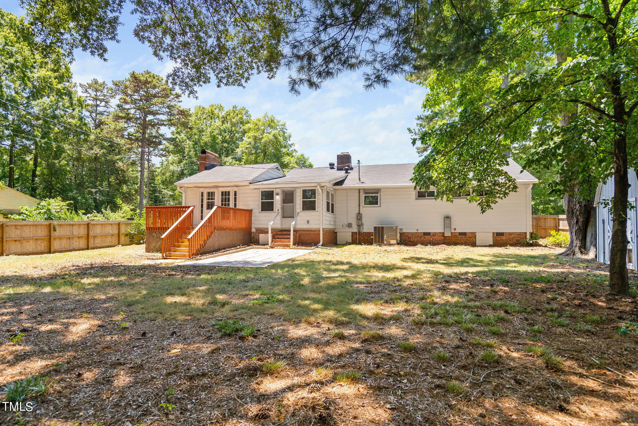 126 Clarendon Crescent Raleigh, NC 27610 - Photo 10 of 40 a view of a house with a yard