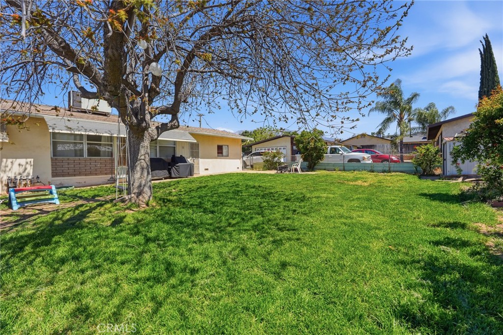 183 East County Line Road Calimesa, CA 92320 - Photo 22 of 31 a view of a house with a yard porch and sitting area