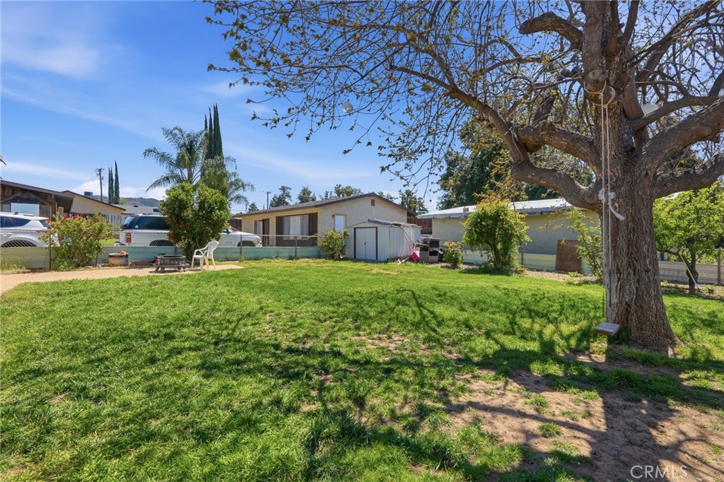 183 East County Line Road Calimesa, CA 92320 - Photo 23 of 31 a front view of a house with garden