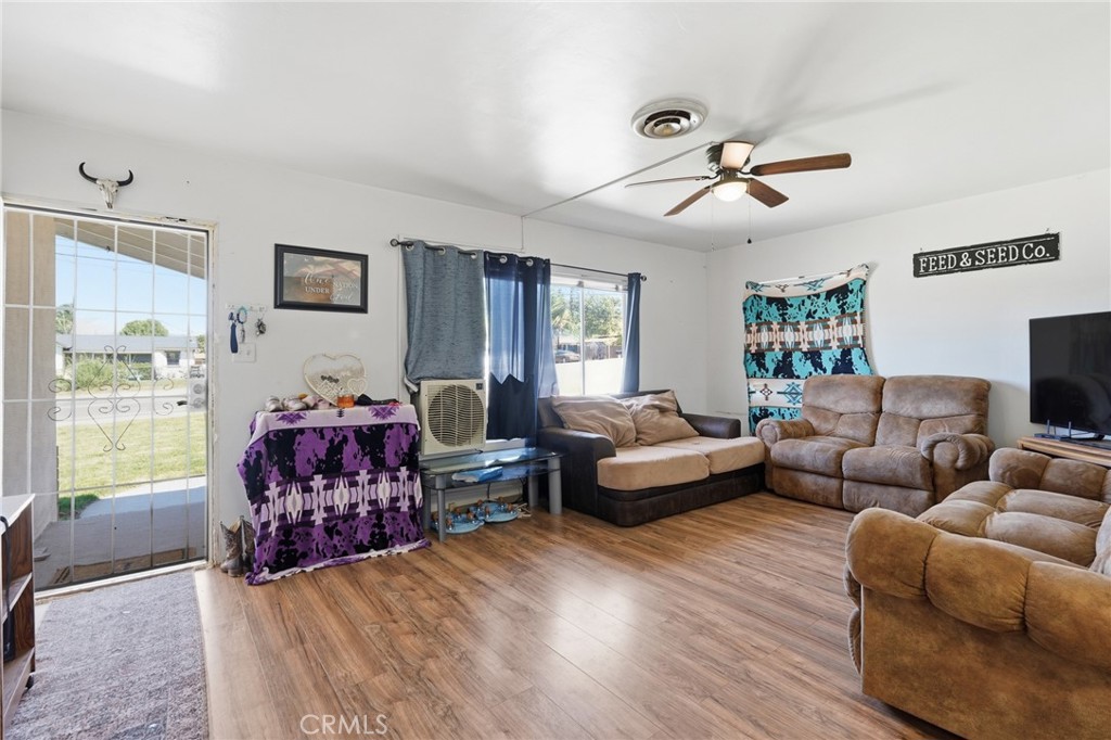 183 East County Line Road Calimesa, CA 92320 - Photo 5 of 31 a living room with furniture and a window