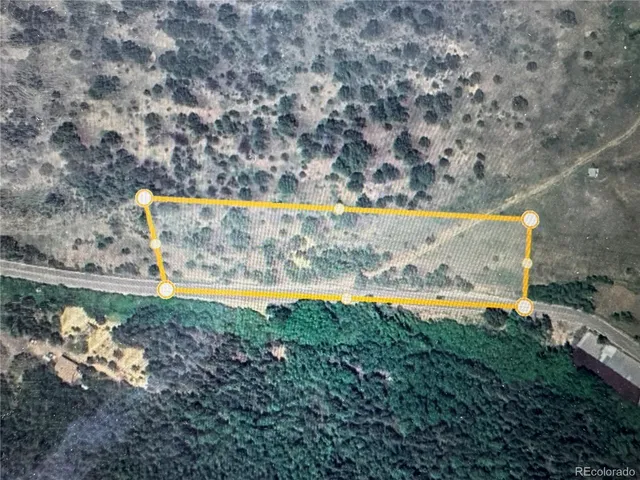 a view of a lake with a yard