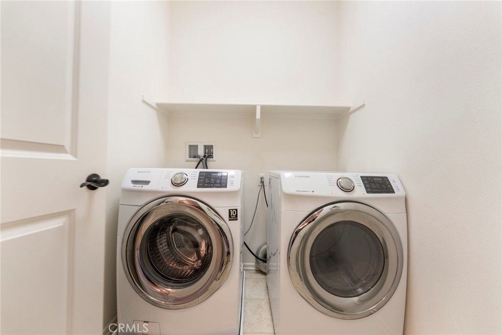 869 East Mountain Way, Unit D Azusa, CA 91702 - Photo 17 of 55 a utility room with dryer and washer