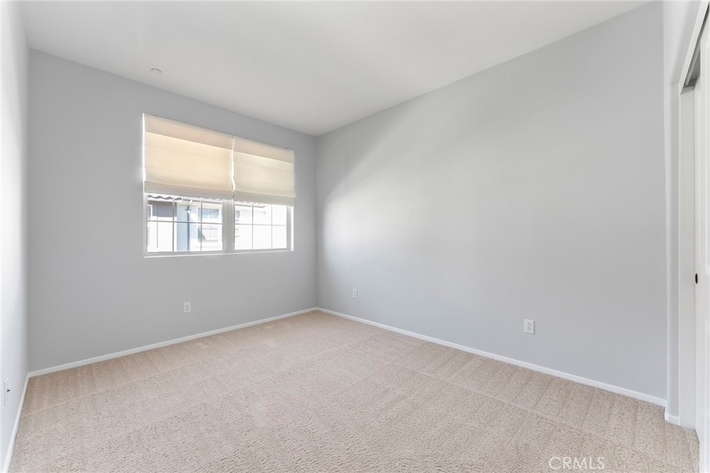 869 East Mountain Way, Unit D Azusa, CA 91702 - Photo 24 of 55 an empty room with windows