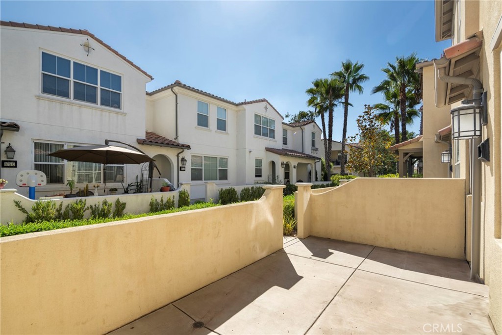 869 East Mountain Way, Unit D Azusa, CA 91702 - Photo 26 of 55 a view of a building with a tub and trees