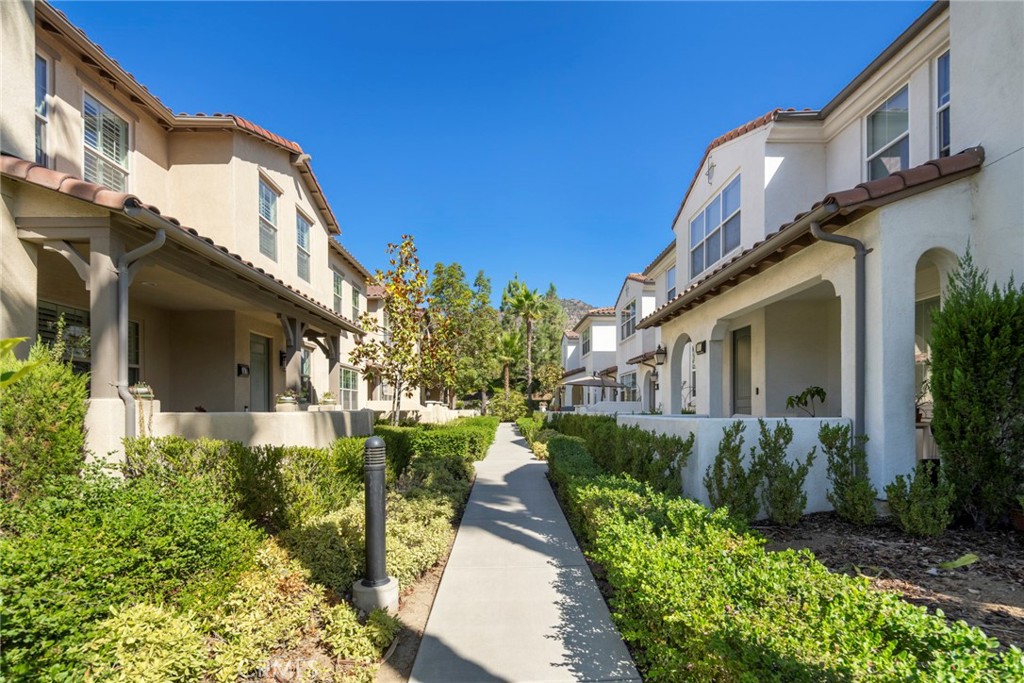 869 East Mountain Way, Unit D Azusa, CA 91702 - Photo 27 of 55 a view of a house with a yard