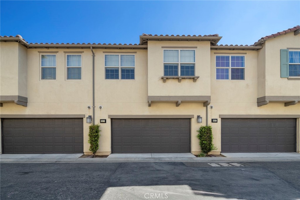 869 East Mountain Way, Unit D Azusa, CA 91702 - Photo 29 of 55 a front view of a house with yard