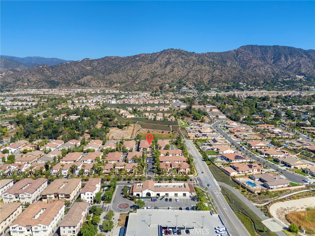 869 East Mountain Way, Unit D Azusa, CA 91702 - Photo 30 of 55 an aerial view of residential houses with outdoor space