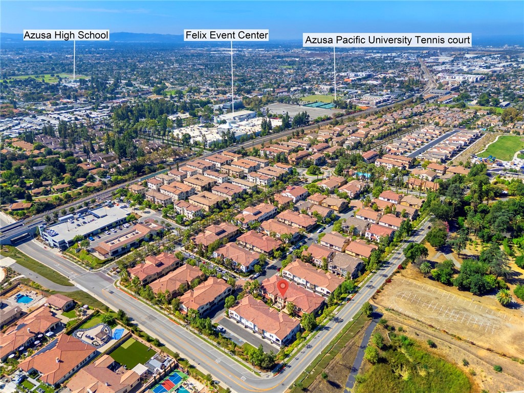 869 East Mountain Way, Unit D Azusa, CA 91702 - Photo 40 of 55 an aerial view of residential houses with city view