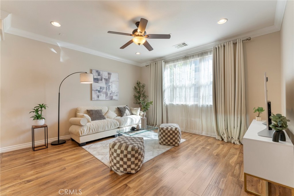 869 East Mountain Way, Unit D Azusa, CA 91702 - Photo 7 of 55 a living room with furniture and window