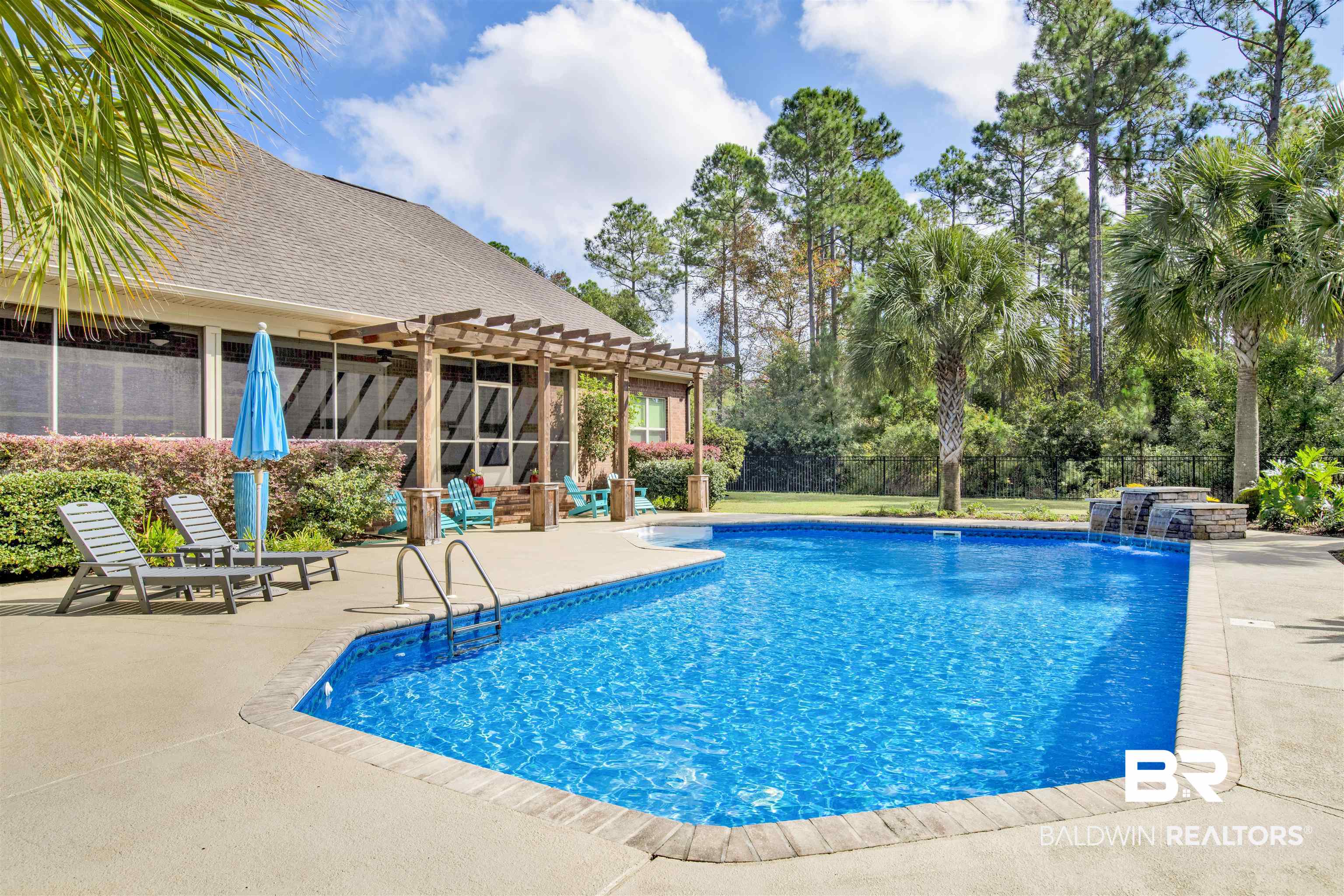 18360 Treasure Oaks Road Gulf Shores, AL 36542 - Photo 48 of 57 View of pool featuring pool water feature, a patio area, a hot tub, and a pergola