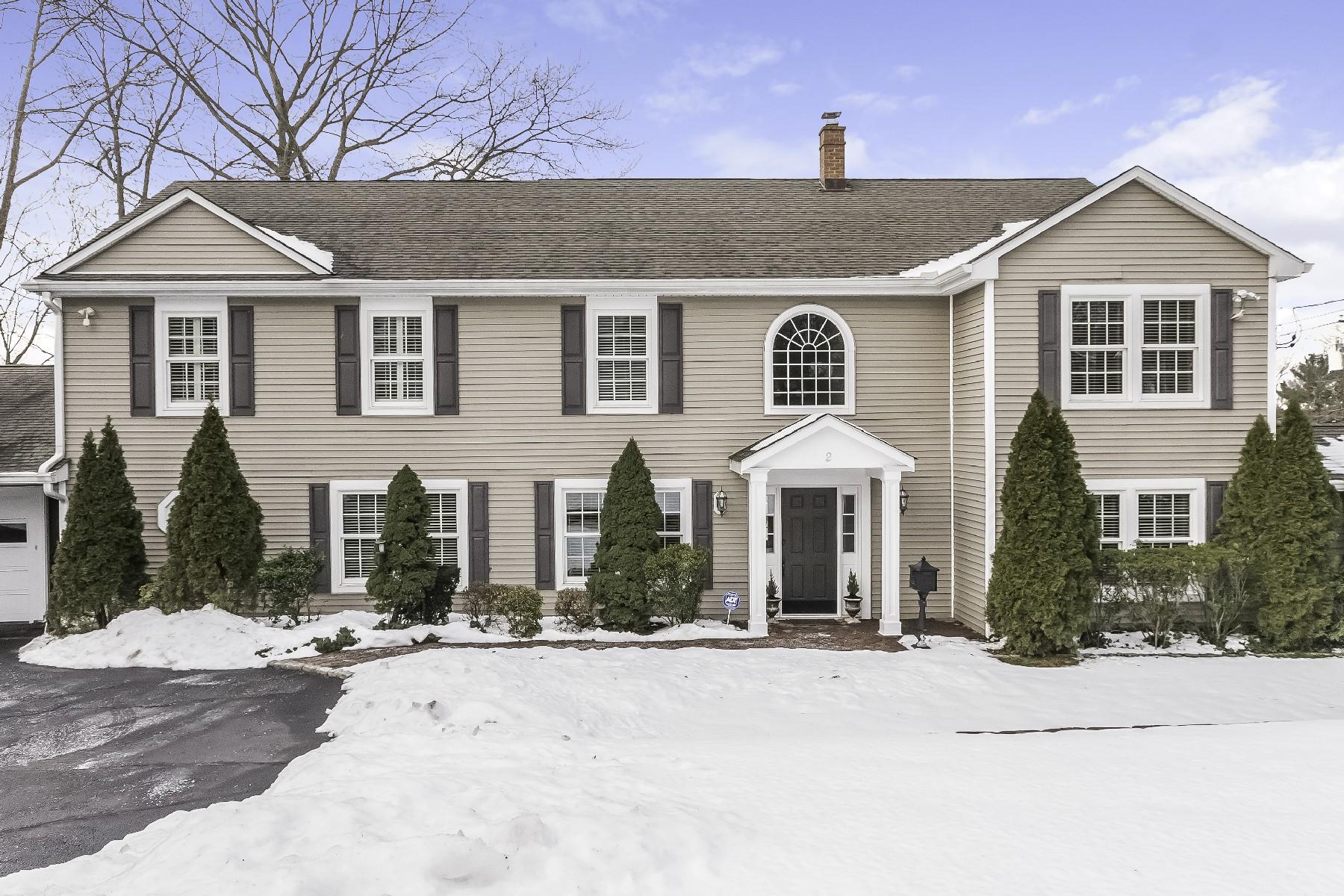 a front view of a house with yard