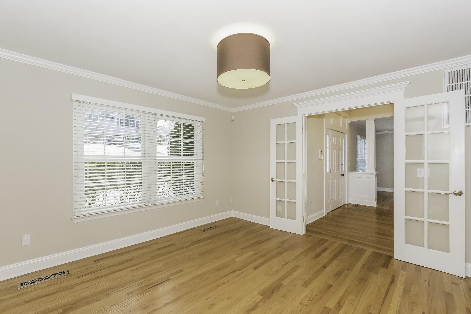 2 Tod Road Norwalk, CT 06851 - Photo 12 of 26 a view of an empty room with wooden floor and a window