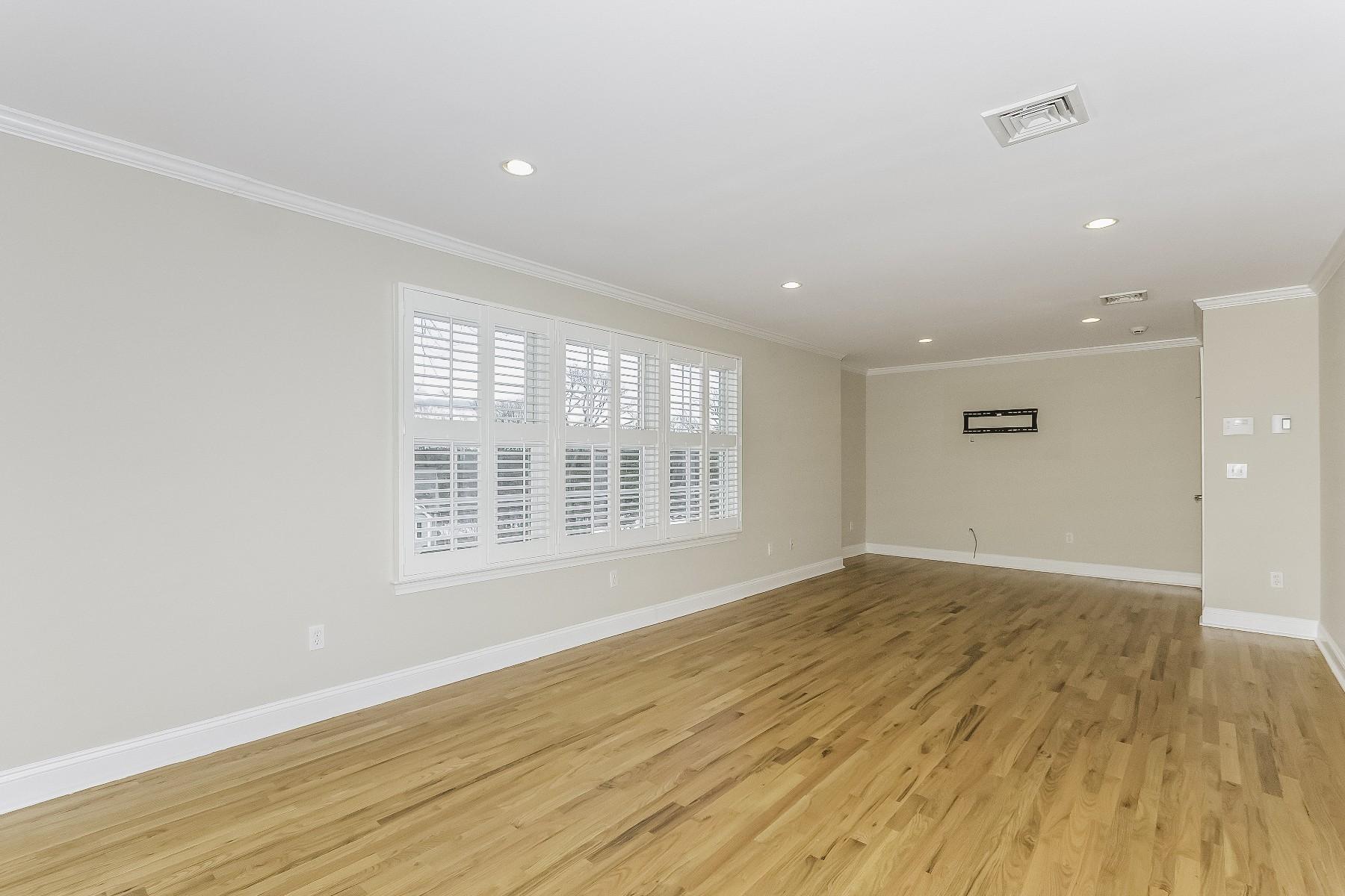 2 Tod Road Norwalk, CT 06851 - Photo 17 of 26 a view of an empty room with wooden floor and a window