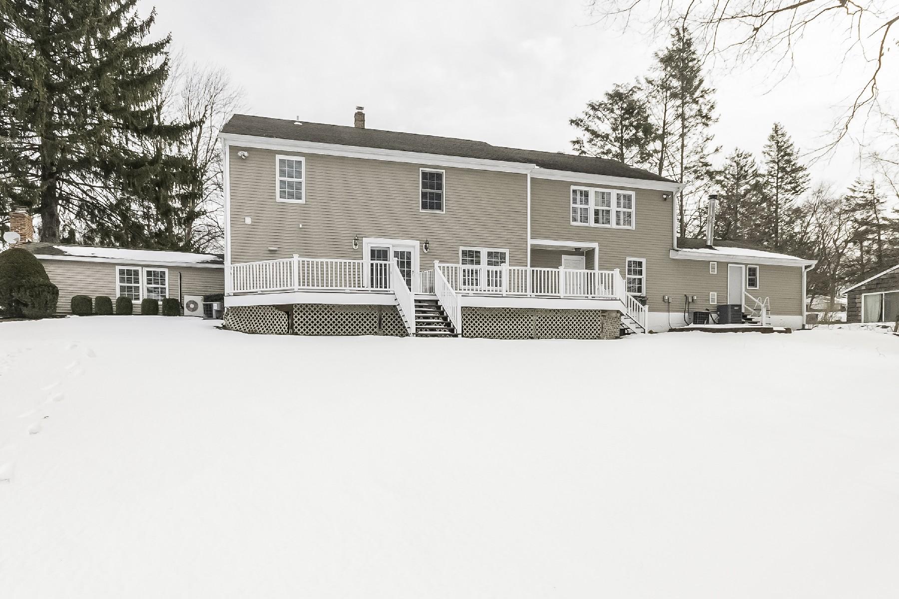 2 Tod Road Norwalk, CT 06851 - Photo 24 of 26 a front view of a house with a yard