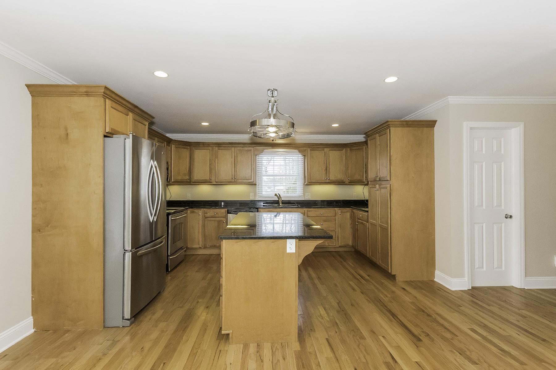 2 Tod Road Norwalk, CT 06851 - Photo 9 of 26 a kitchen with a refrigerator and a sink