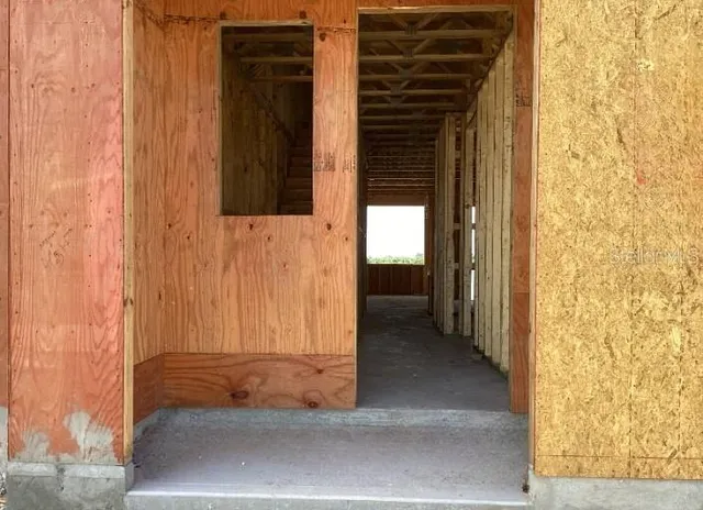 an empty room with windows