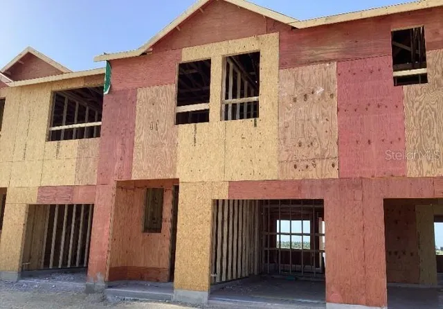 a front view of a house with windows