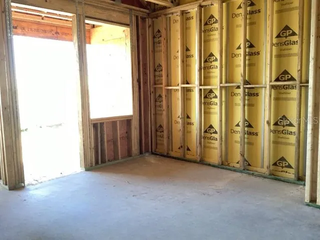 an empty room with windows